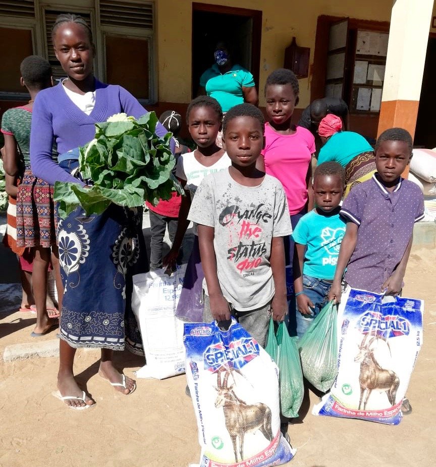 Providing food baskets to students in Mozambique