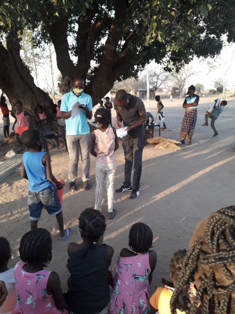 Providing food baskets to students in Mozambique