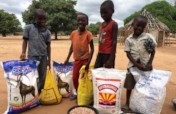 Providing food baskets to students in Mozambique