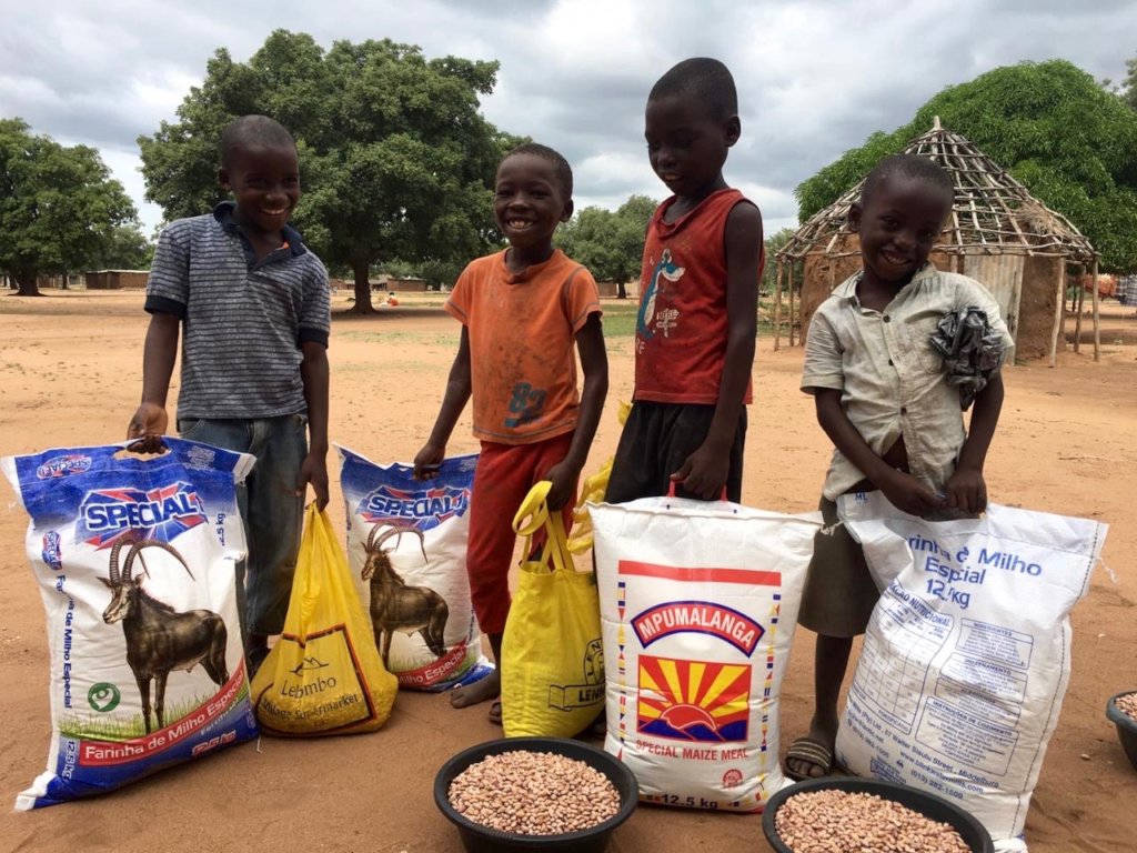 Providing food baskets to students in Mozambique