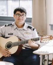 ROTC Student at Hoover with His GITC Guitar