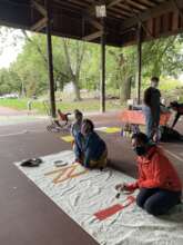 Jaylnne & Amber painting the banner.