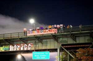 The banner drop for Orange Shirt Day.