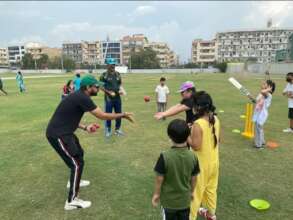 Individuals with Down syndrome learning cricket