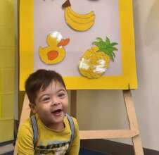 A child enjoying "Yellow Day"