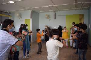 Children & adults enjoying Music & Movement class