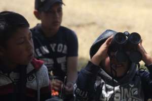 Field activity with children next to local wetland