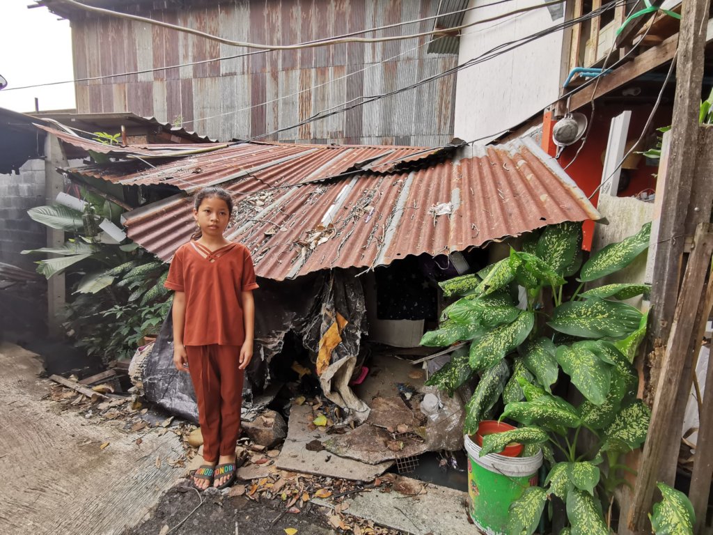 Fareeda with her house