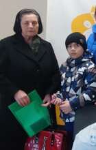 Grandmother and Grandson Receive Aid from Kidsave