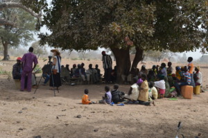Villagers meet with BARKA under the tree