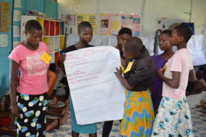 Girls presenting at girls Human Rights workshop