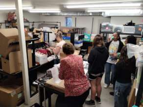 Volunteers organizing and packing