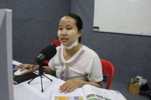Migrant teacher conducting online class