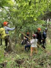 Child participants are helping with the work.