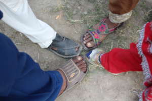 help muwakhat for distibution of winter shoes