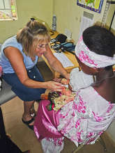 Sandi Speech Pathologist giving meds