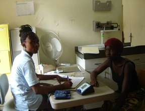 Checking in a patient at the clinic