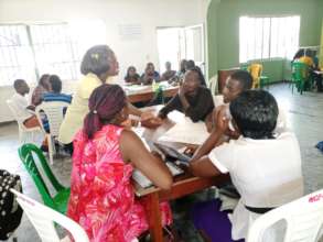 Coordinator giving instruction in group session