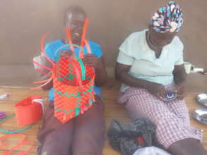 Sauda and her group members making their crafts
