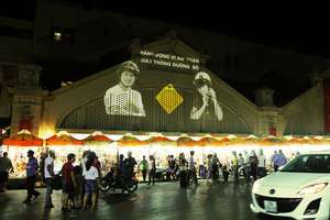Decade Tag projected on Dong Xuan Market in Hanoi