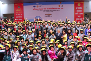 Ai Mo A school children wearing helmets from GM