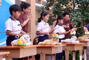 Students learn about the importance of helmet use