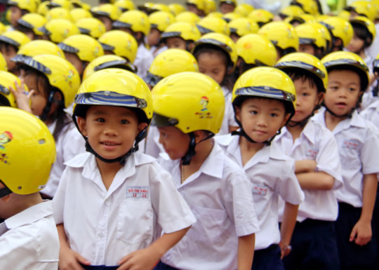 Give a Vietnamese child a helmet; save a life