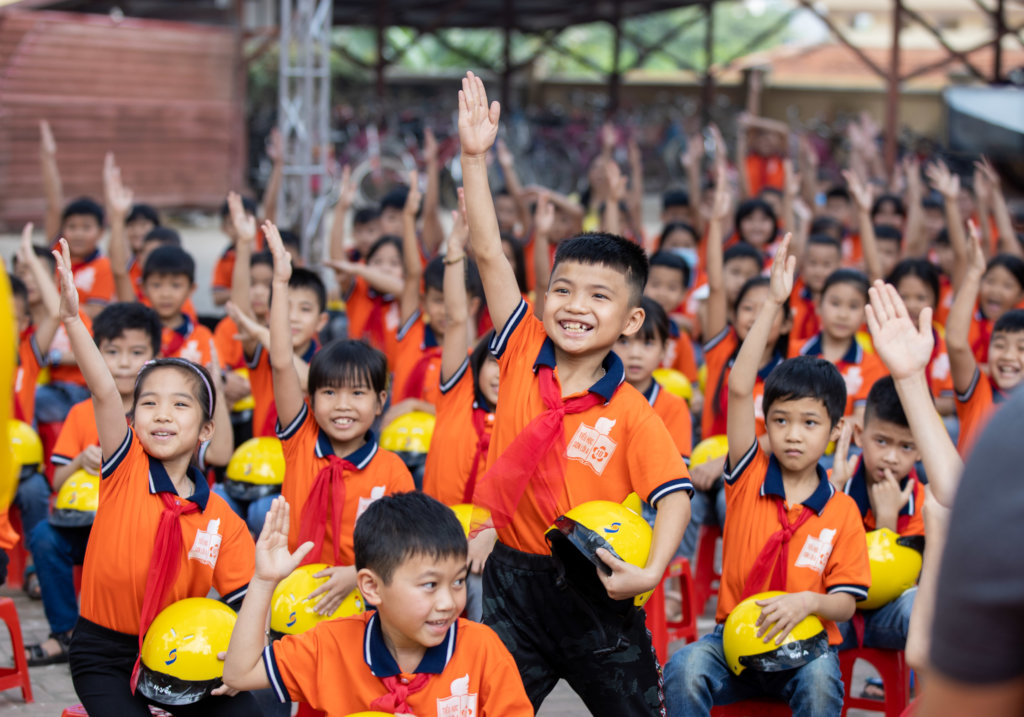 Give a Vietnamese child a helmet; save a life