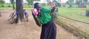 Jane after receiving a pack of sanitary pads