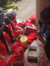 Preparing food packs for distribution.