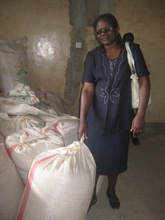 Sandota School director receives corn for school