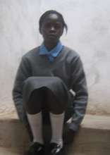 Pauline in Her Secondary School Uniform