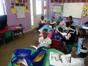 Our kids love two things: Reading and Silly Hats!