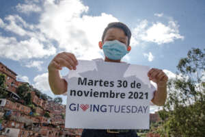 Student inviting you to donate on Giving Tuesday
