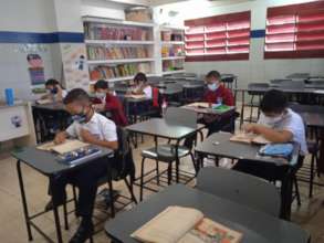 Students maintaining safe distance & wearing mask