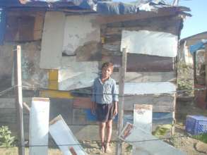 AHCC child in front of his home in Cienfuegos.