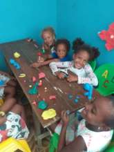 AHCC children engaged in play.