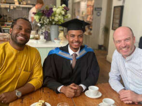 Celebrating Thiery's graduation with staff
