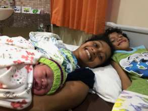 Rachel Monoach with two of her five kids