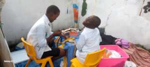 Budding Dr Eunice practicing her skills!