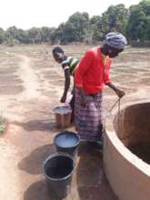 Irrigation water is supplied manually by women
