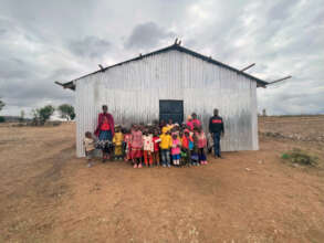 Naserian with children at the new preschool, 2022.