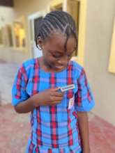 TH Beneficiary celebrating her win as Head Girl