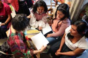 Artisans and designer sharing ideas