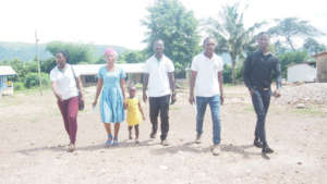 Teacher Teresa with Maxwell and WIN volunteers