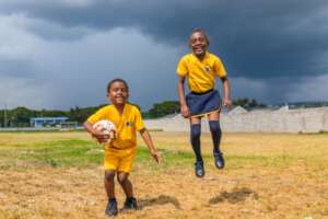 Students will be seeing green fields in Jamaica.