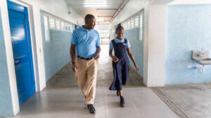 Principal Jason Scott with a student