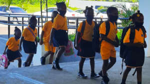 Students arrive at Christel House Jamaica.