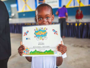 Michael celebrates his achievement.