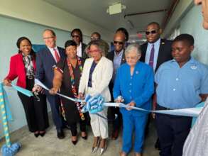 Ribbon cutting for new high school in Jamaica.